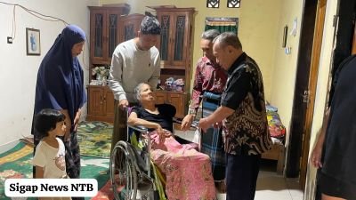 baznas-lotim-salurkan-kursi-roda-untuk-warga-sukamulia